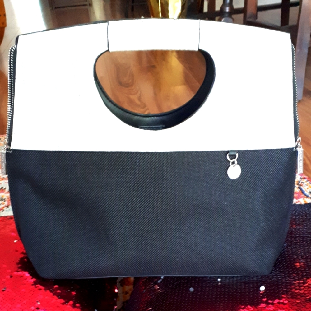 Celine Dion Handbag. Black and embossed snake skin in white and silver.